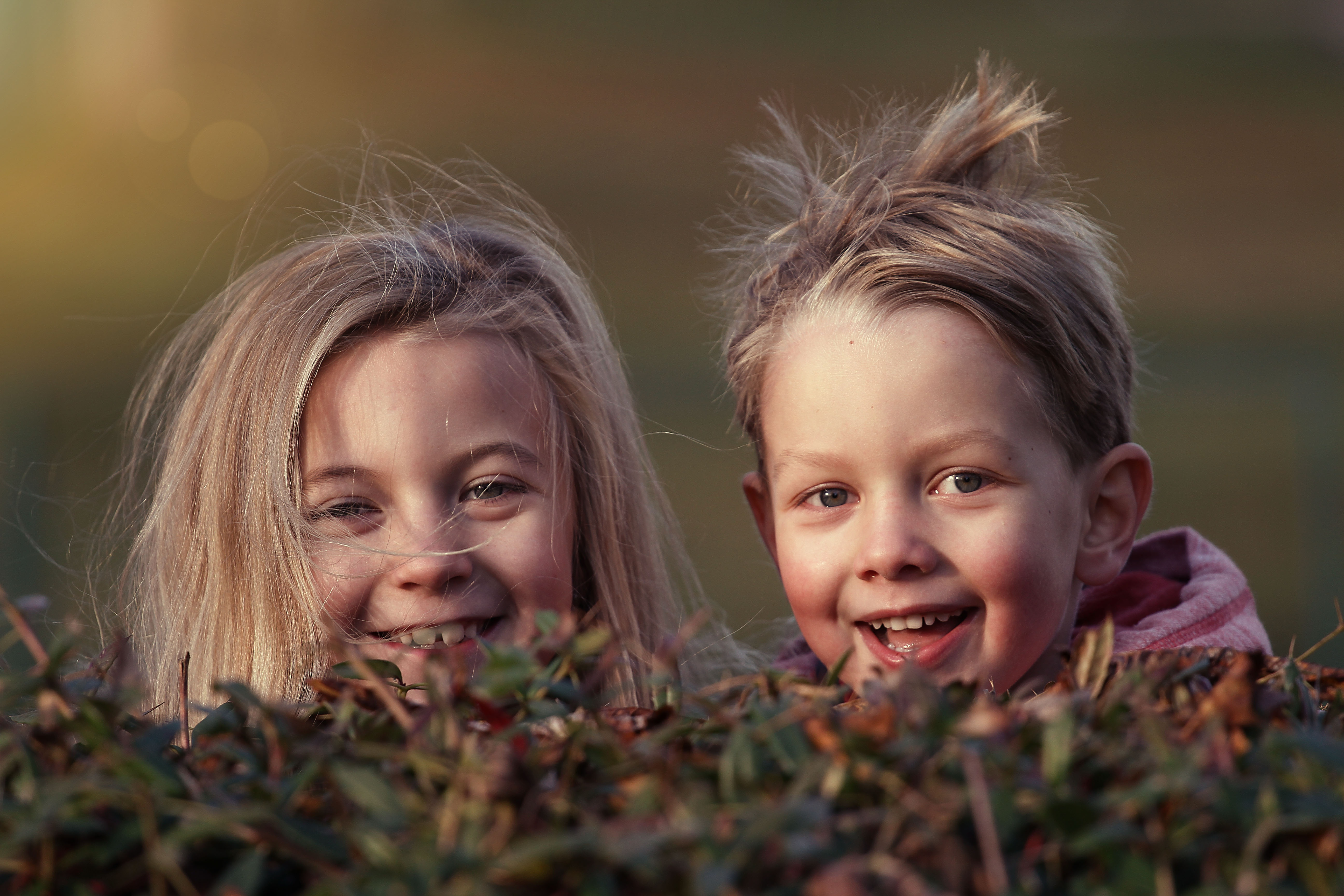Canva - Children Laughing Outdoors
